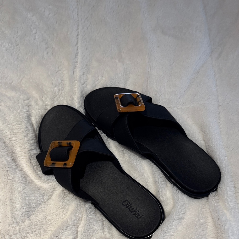 OluKai Black Sandals with Tan Buckle
